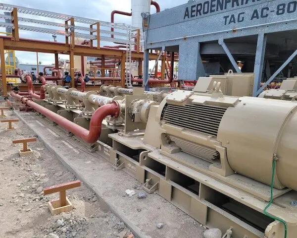 Industrial machinery with pipes and motors.