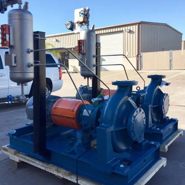 Industrial pumps and machinery on a pallet.