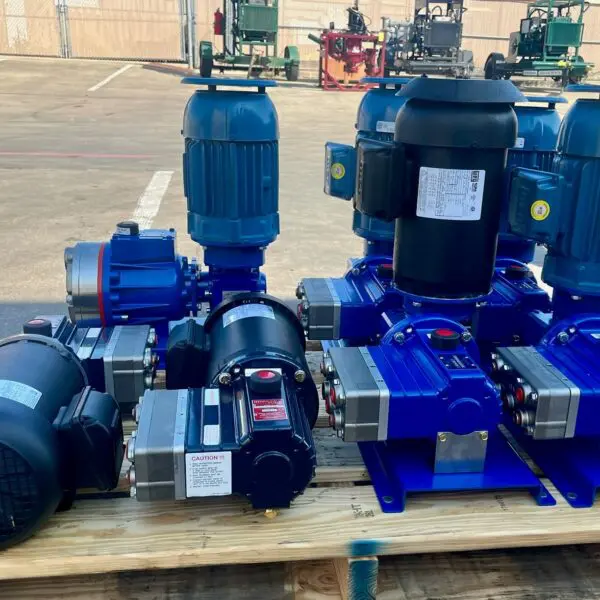 Industrial motors and pumps arranged on a pallet.