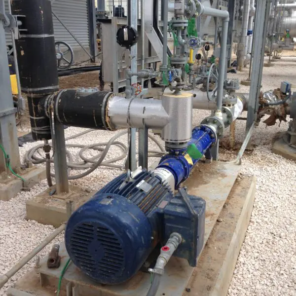 Industrial pump and piping system setup.