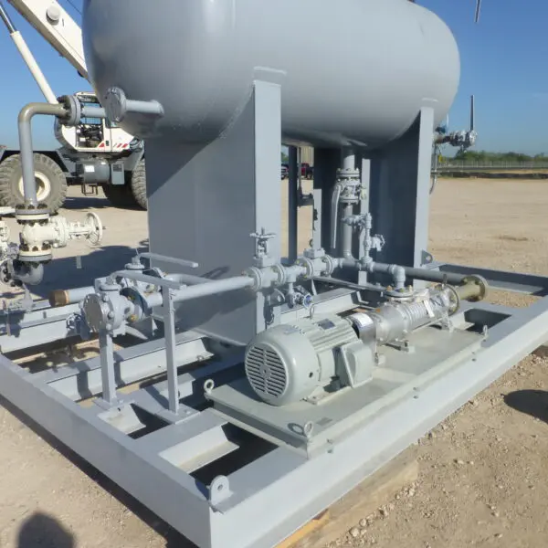 Industrial machinery on a gravel surface.