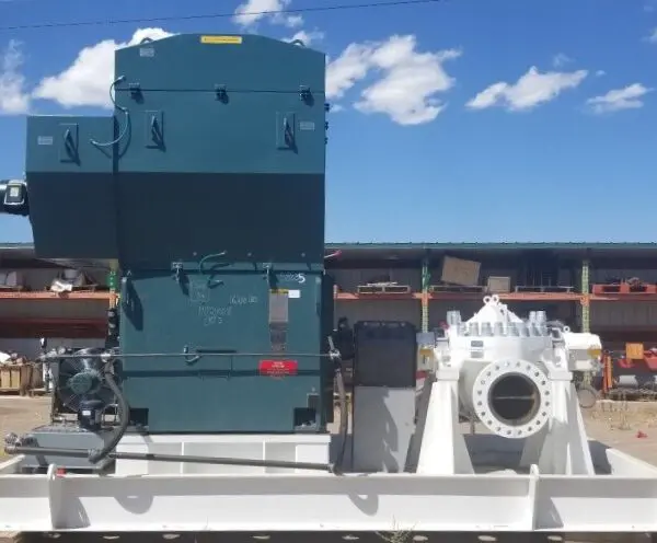 Industrial machinery against a blue sky.